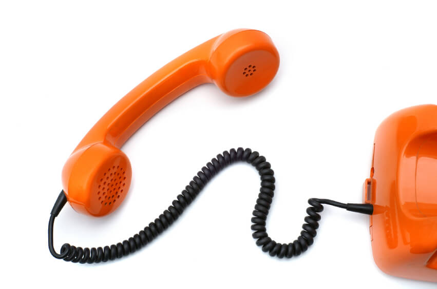 Orange corded telephone